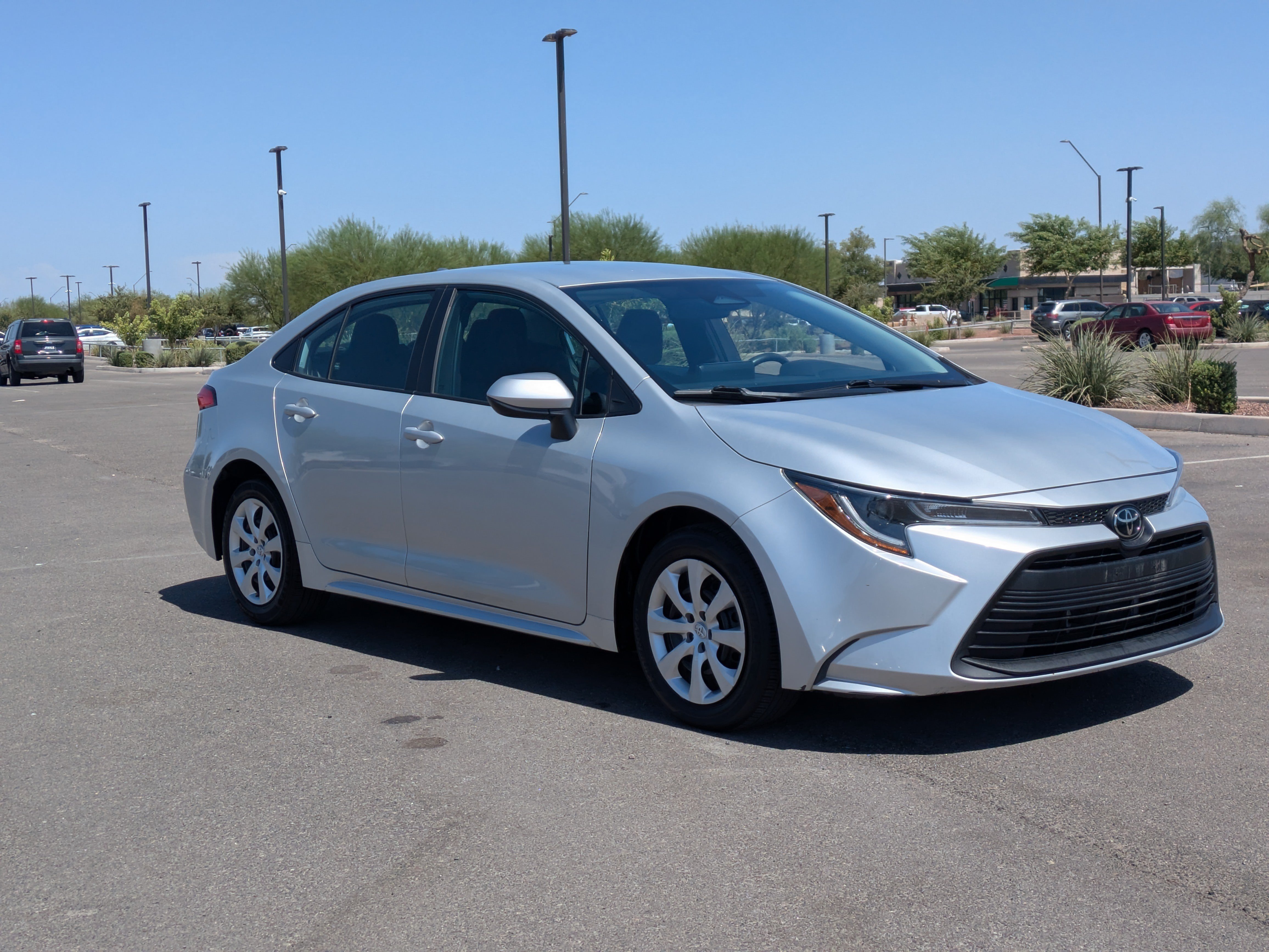 Used 2024 Classic Silver Metallic Toyota LE image 7