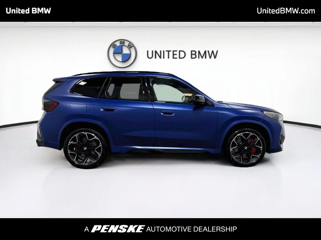 Used 2026 Frozen Portimao Blue II Metallic BMW M35i image 4