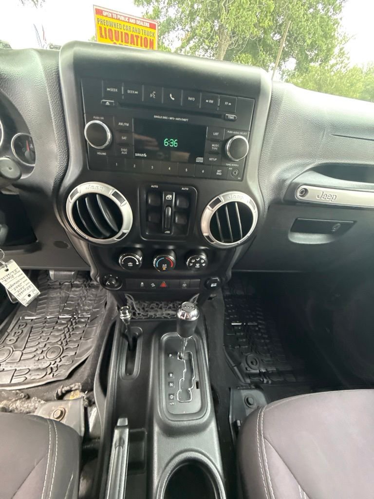 Used 2014 Black Jeep Unlimited Rubicon image 16