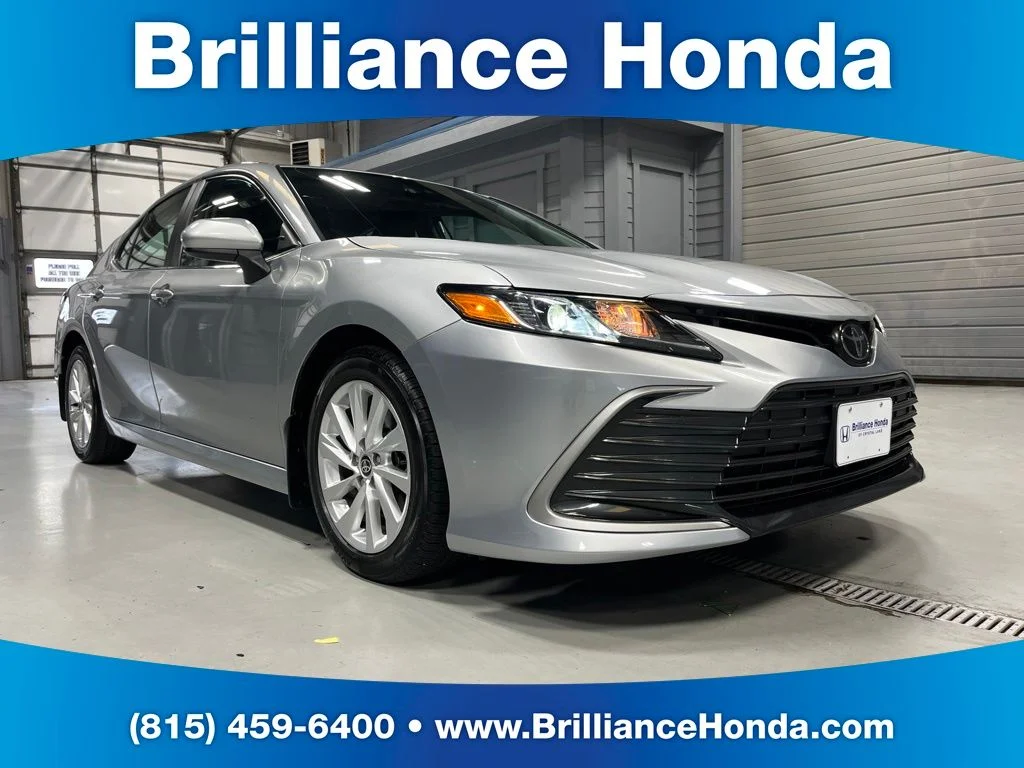 Used 2023 Celestial Silver Metallic Toyota LE image 1