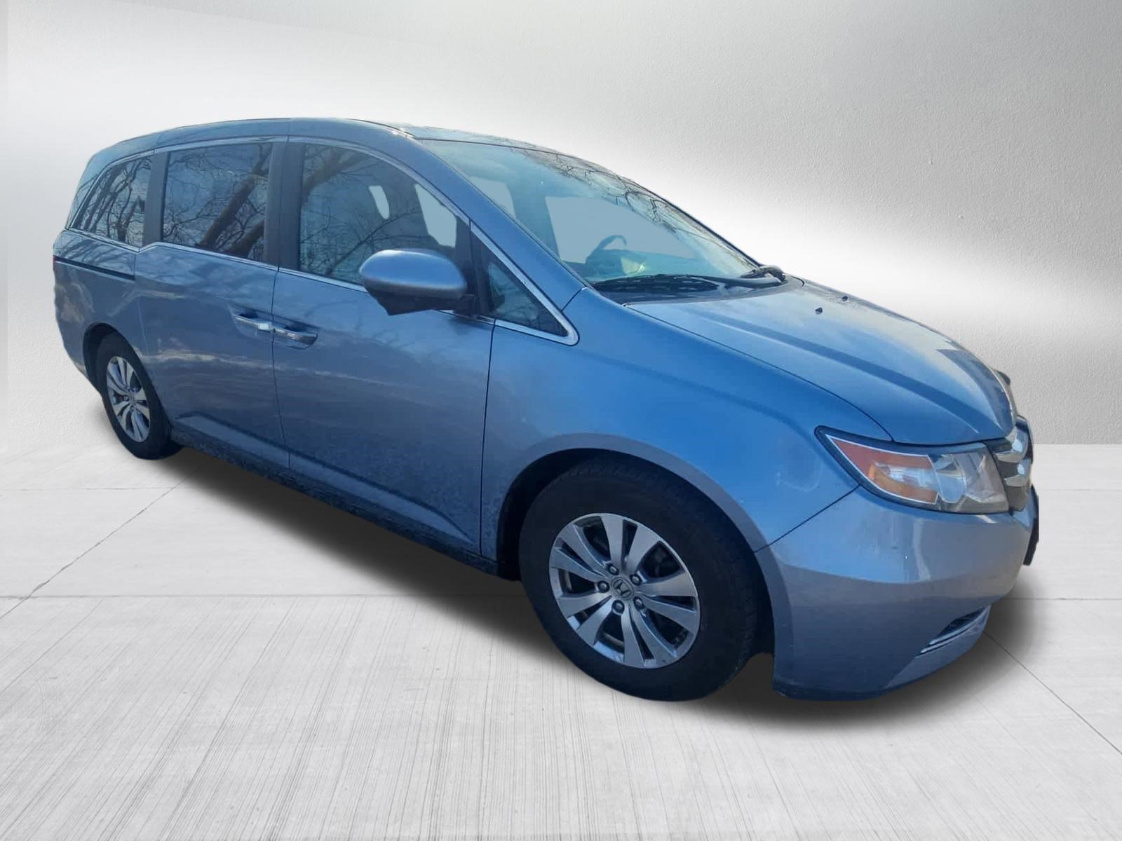 Used 2014 Honda Odyssey EX-L with VIN 5FNRL5H69EB094070 for sale in Hopkins, Minnesota