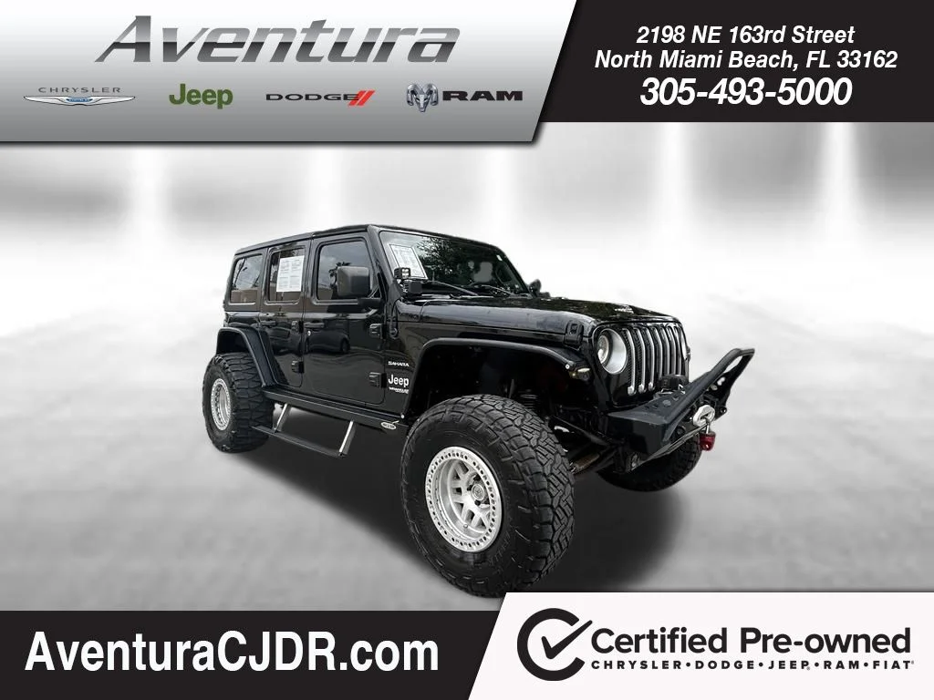 Used 2018 Black Jeep Unlimited Sahara image 1