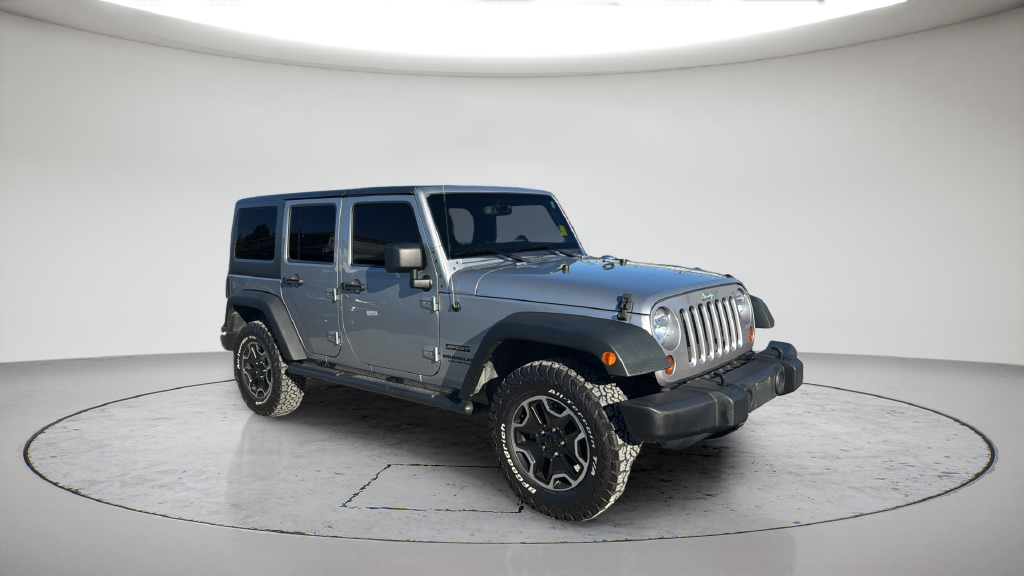 Used 2013 Silver Jeep Unlimited Sport image 5