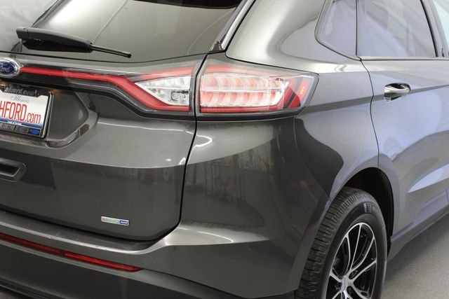 Used 2016 Magnetic Metallic Ford SE image 9