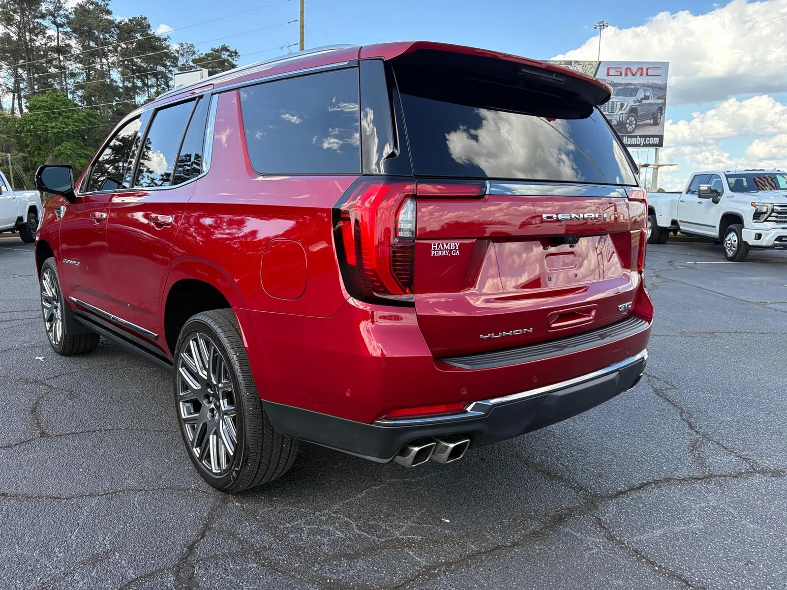 Used 2026 Volcanic Red Tintcoat GMC Denali Ultimate image 7