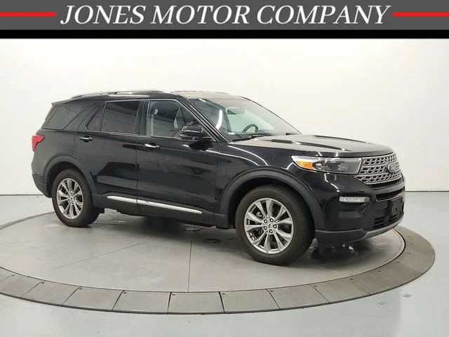 Used 2021 Agate Black Metallic Ford Limited image 1
