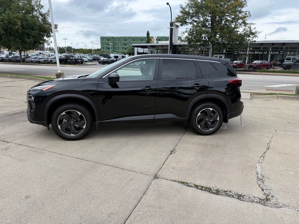 Used 2024 Black Nissan SV image 1