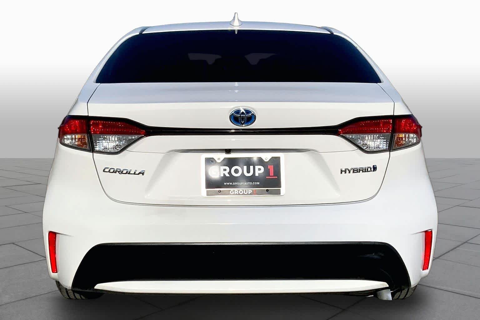 Used 2020 Super White Toyota Hybrid LE image 5