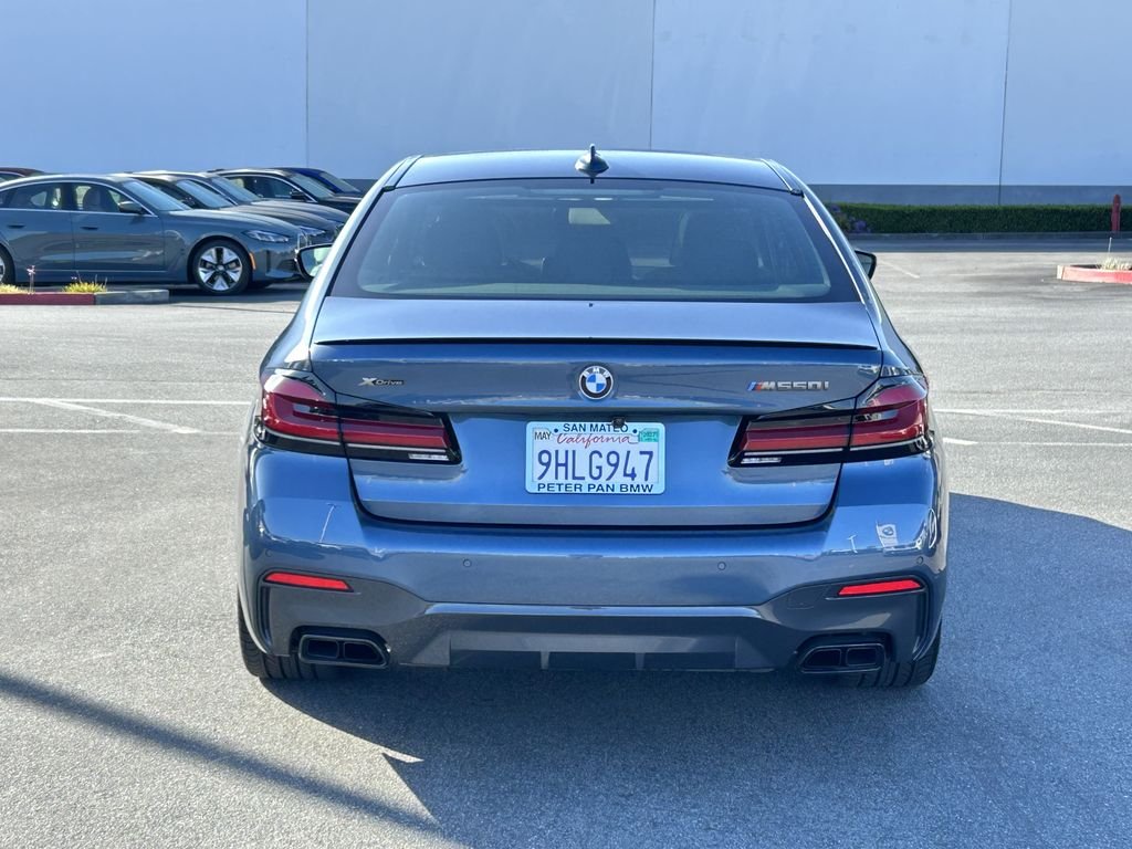 Used 2023 Arctic Race Blue metallic BMW M550i xDrive image 4