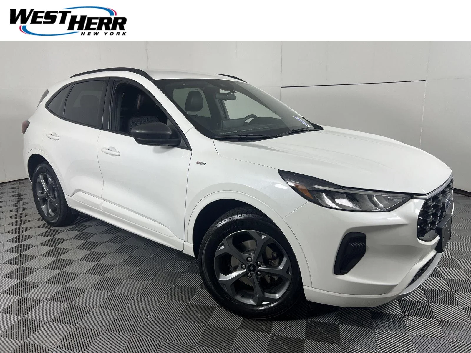 Used 2023 Star White Metallic Tri-Coat Ford ST-Line image 1