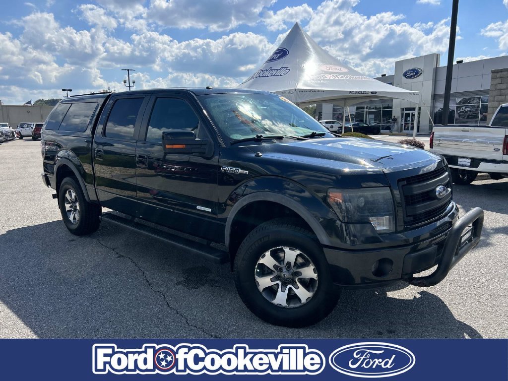 Used 2013 Tuxedo Black Metallic Ford FX4 image 1