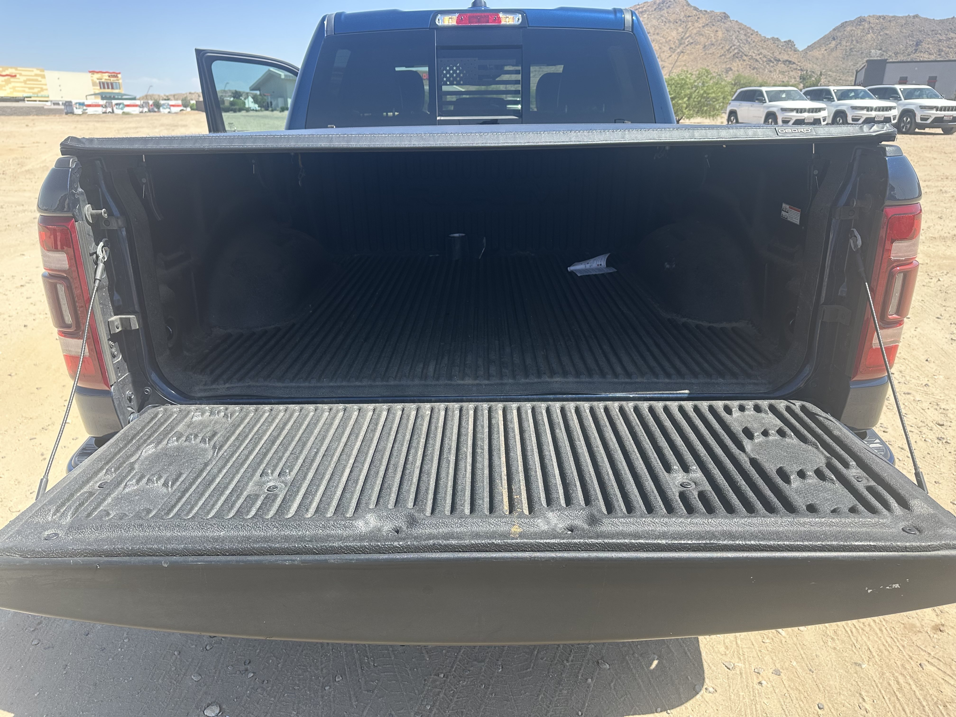 Used 2024 Patriot Blue Pearlcoat Ram Laramie image 21