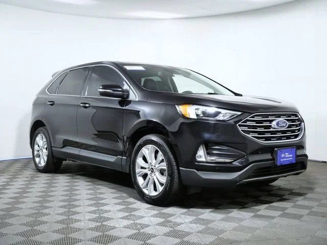Used 2023 Black Ford Titanium image 1