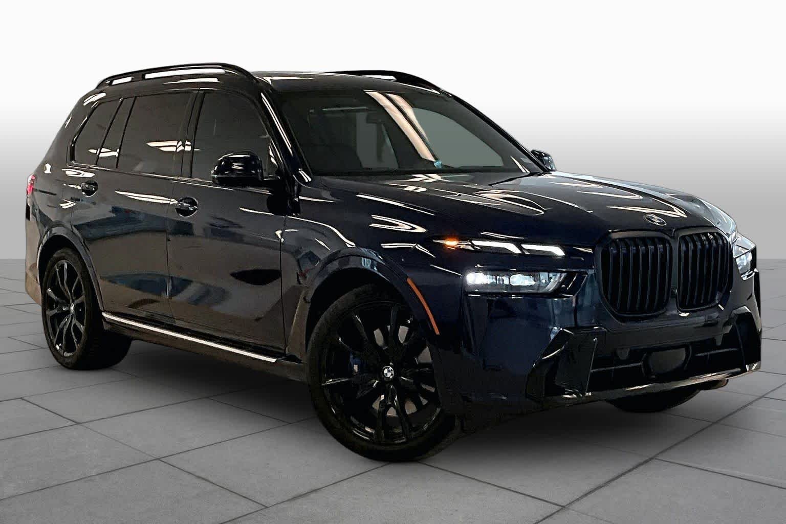 Used 2024 Tanzanite Blue II Metallic BMW xDrive40i image 2