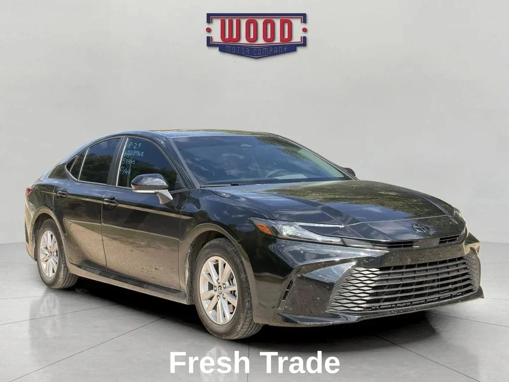 Used 2025 Midnight Black Metallic Toyota LE image 1