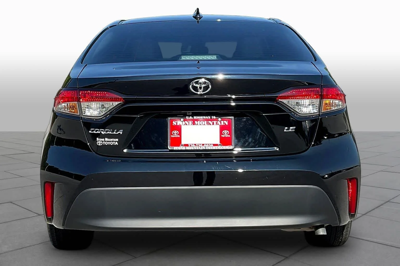 Used 2024 Midnight Black Metallic Toyota LE image 5