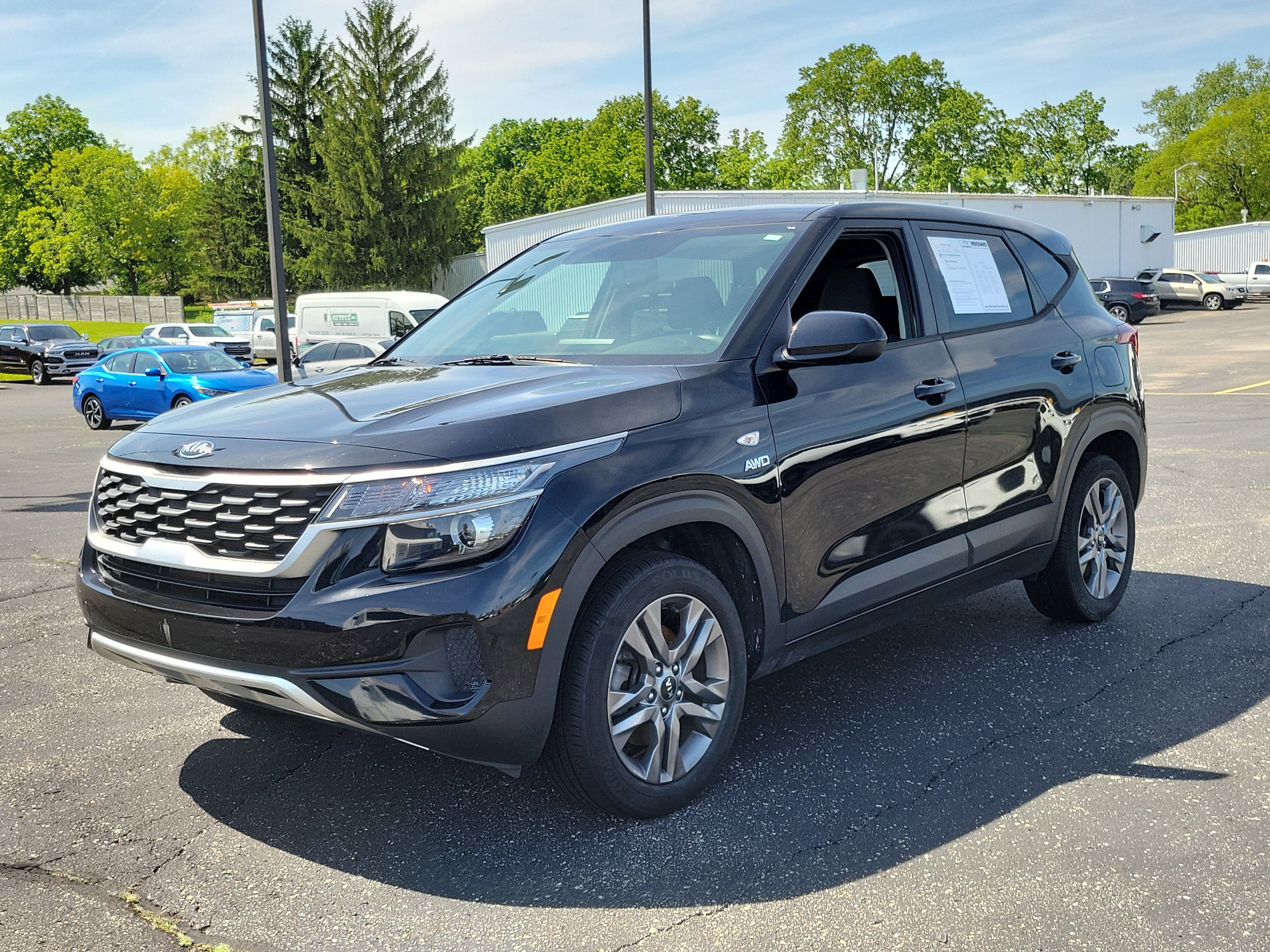 Used 2021 Kia Seltos LX with VIN KNDEPCAA8M7141714 for sale in Brookville, OH