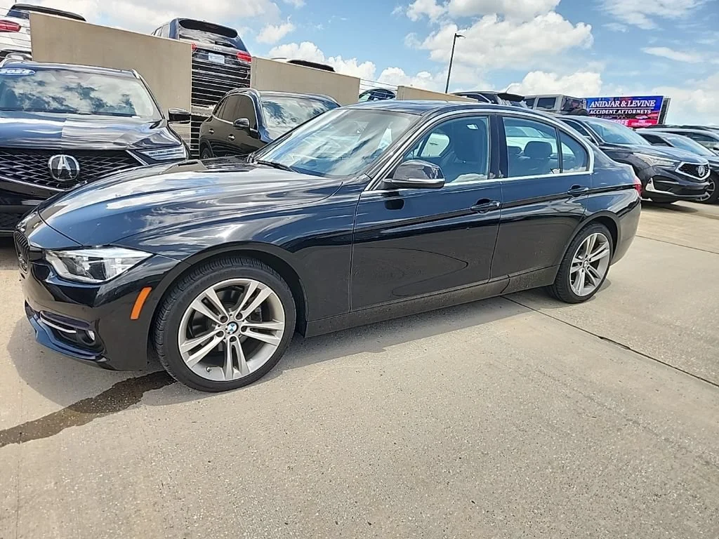 Used 2017 Black Sapphire Metallic BMW 328d xDrive image 1