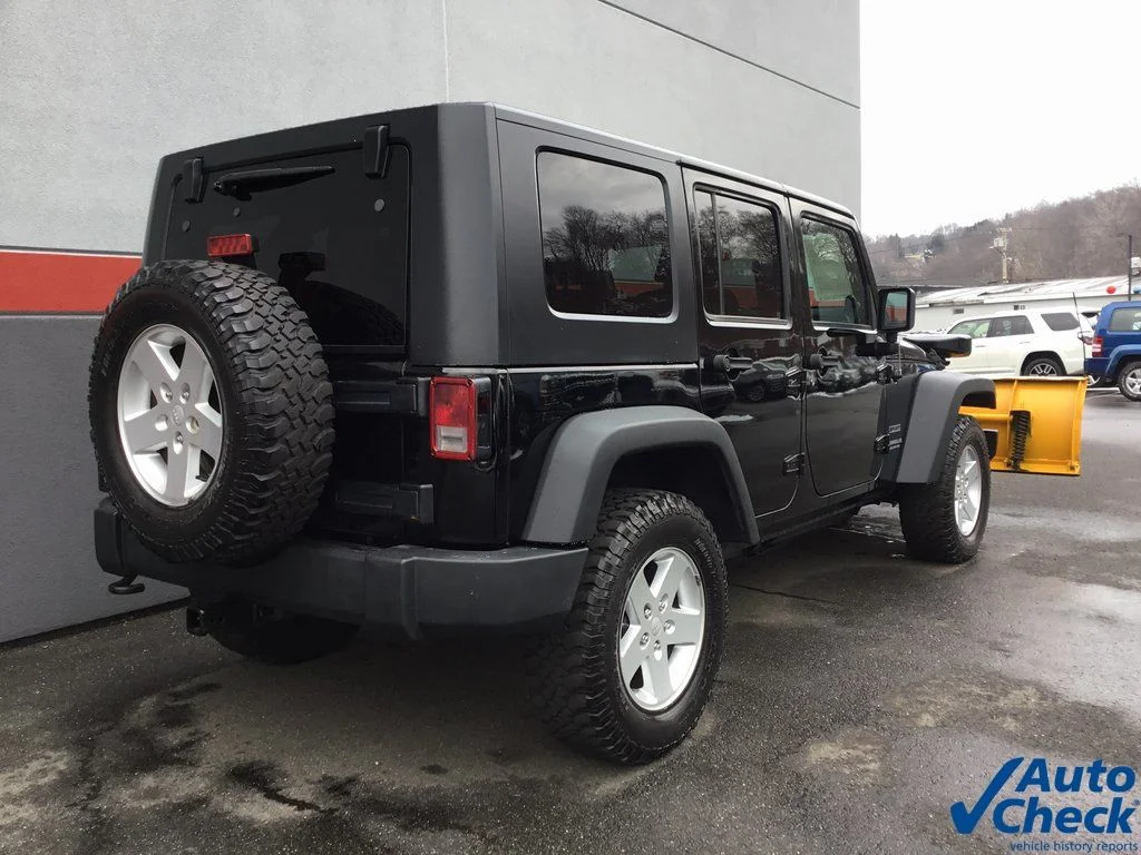 Used 2010 Black Jeep Unlimited Sport image 10