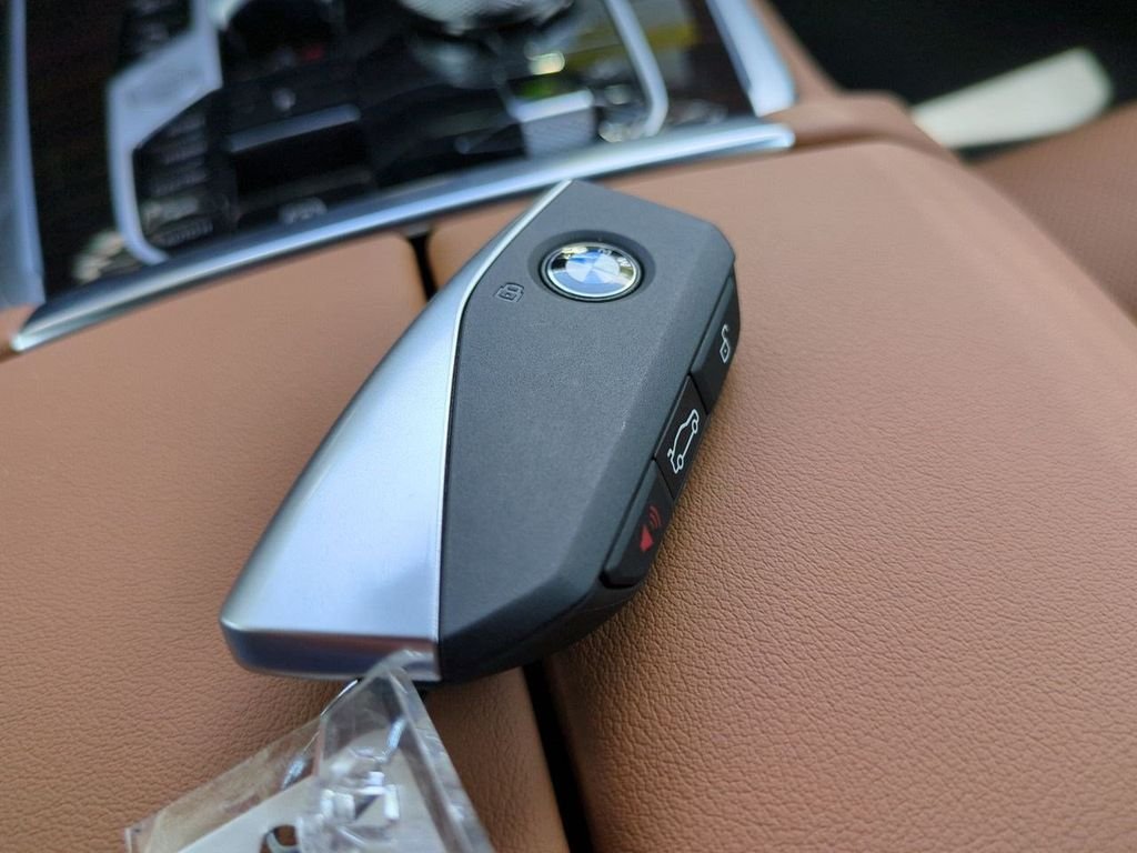 New 2026 Black Sapphire Metallic BMW xDrive50e image 29
