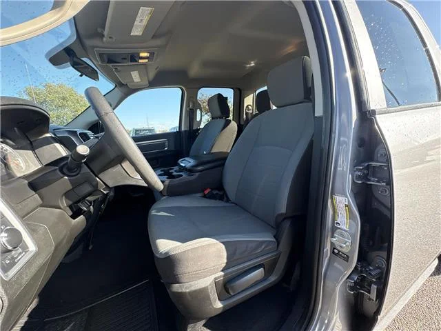 Used 2024 Granite Crystal Metallic Clearcoat RAM SLT 4x4 Quad Cab 6.3 ft. box 140 in. WB image 16