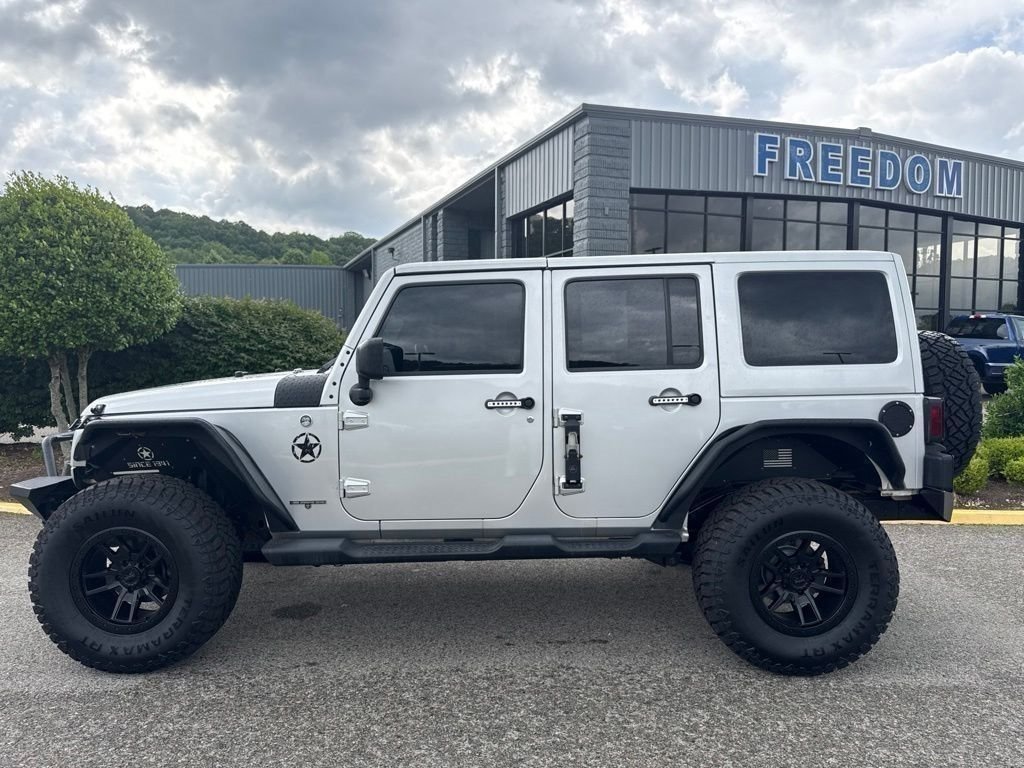 Used 2012 Jeep Wrangler Unlimited Sahara with VIN 1C4BJWEG5CL260248 for sale in Pounding Mill, VA