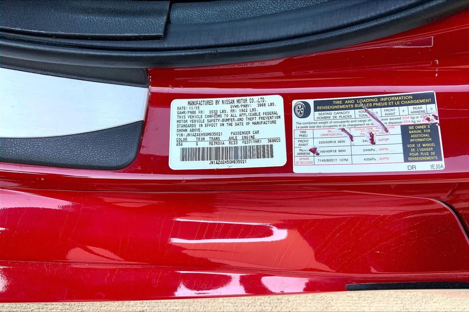 Used 2016 Solid Red Nissan Touring image 32
