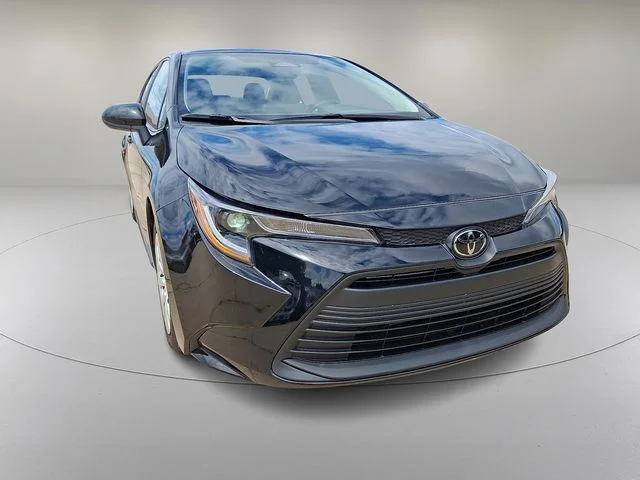 Used 2024 Black Toyota LE image 2