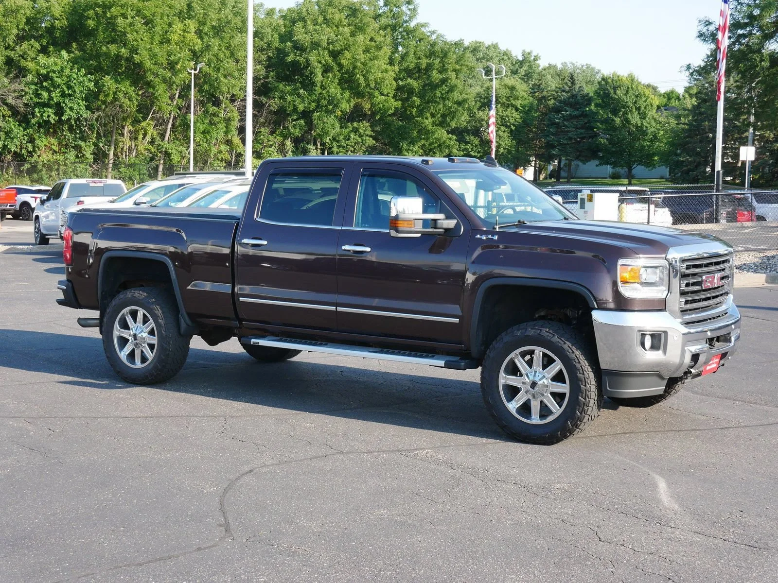 Used 2016 GMC Sierra 2500HD SLT with VIN 1GT12TEG9GF139914 for sale in White Bear Lake, Minnesota