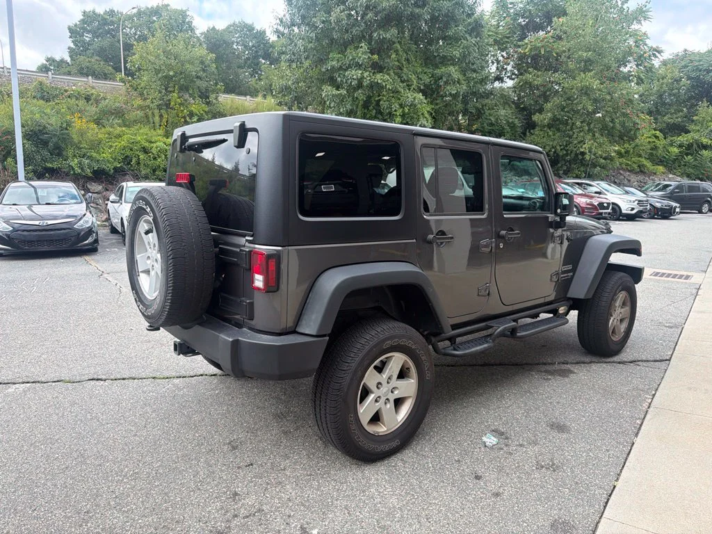 Used 2018 Crystal Metallic Jeep Unlimited Sport image 4