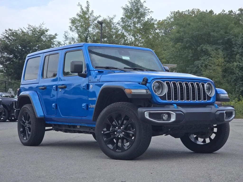 Used 2024 Blue Jeep Sahara 4xe image 1