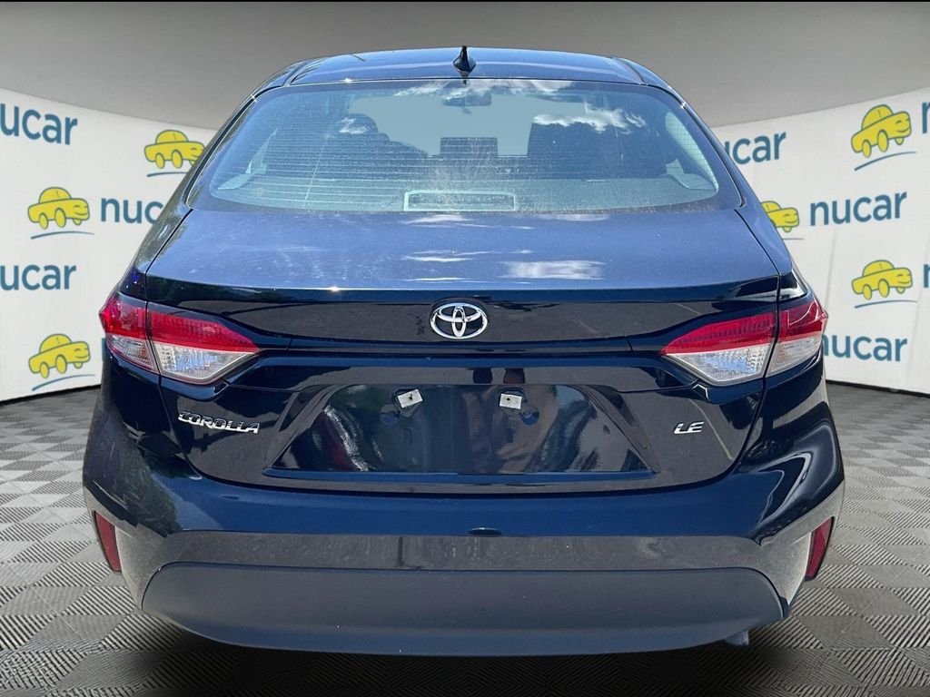 Used 2024 Black Toyota LE image 3