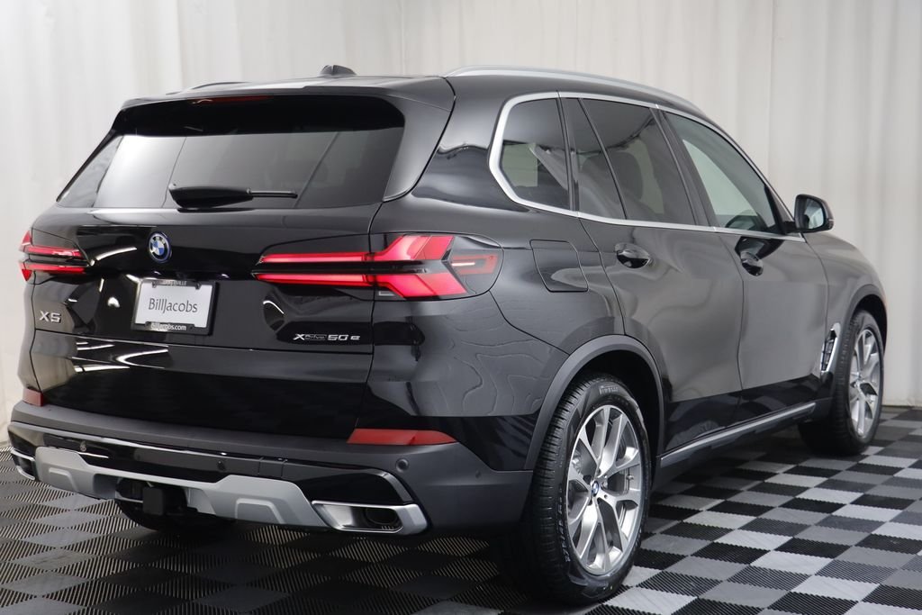 New 2026 Black Sapphire Metallic BMW xDrive50e image 19