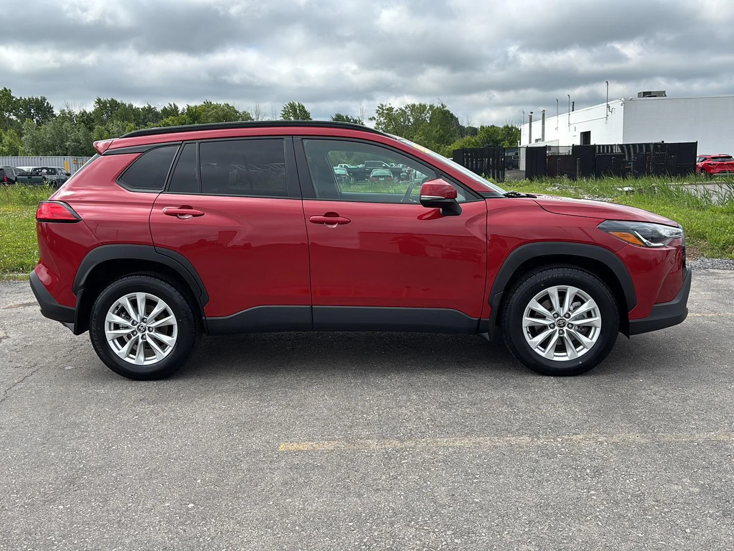 Used 2023 Barcelona Red Metallic Toyota LE image 8