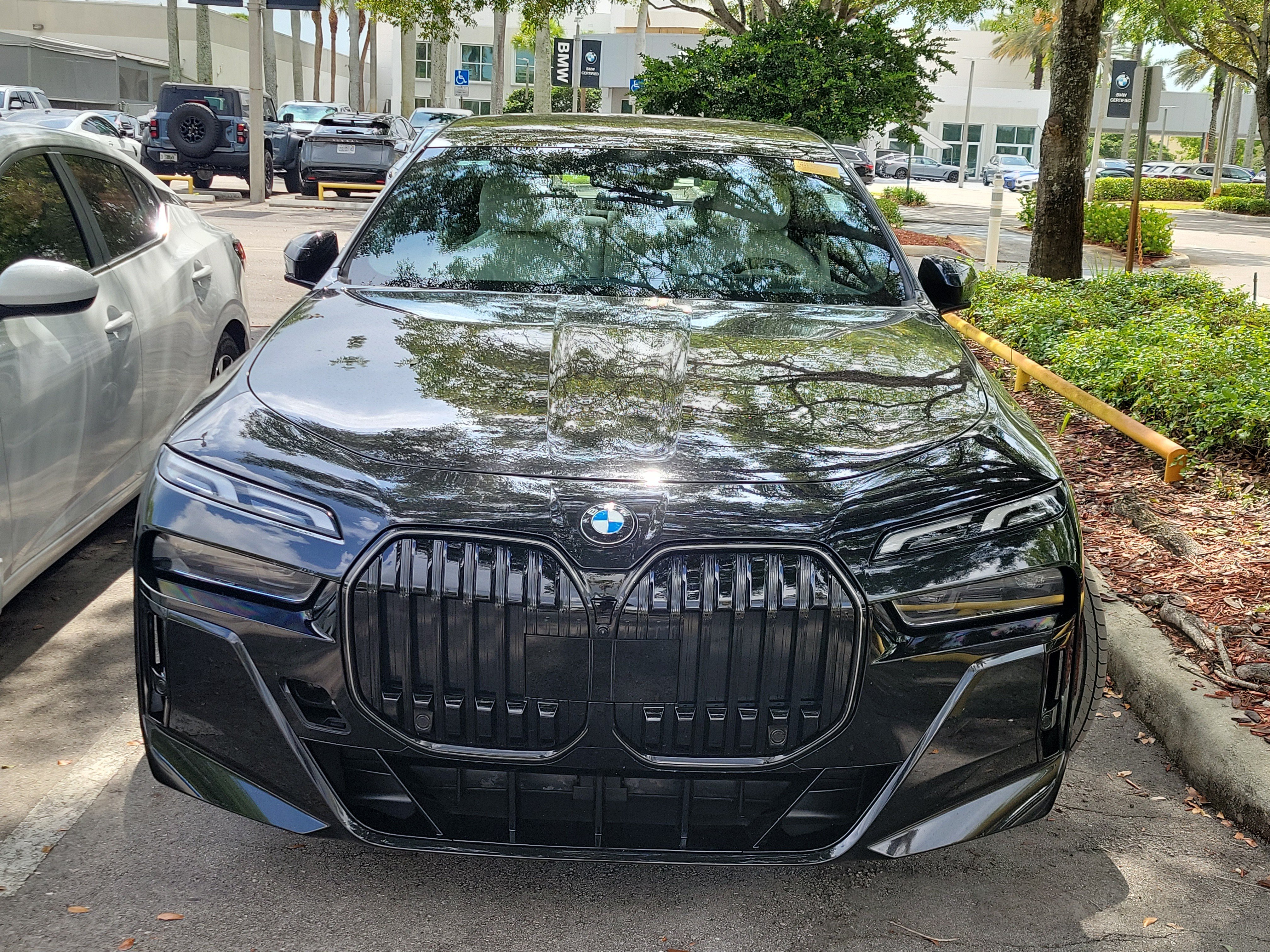 Used 2025 Black Sapphire Metallic BMW 740i image 2