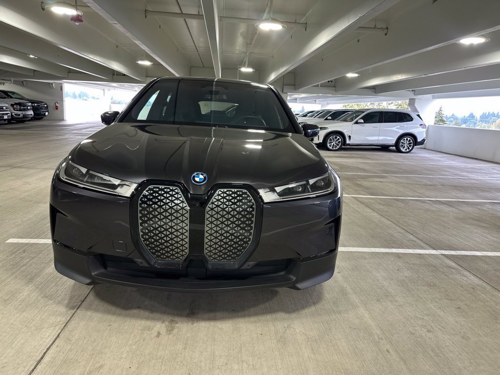 Certified Used 2024 Dark Graphite Metallic BMW xDrive50 image 1