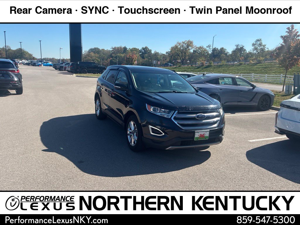 Used 2016 Shadow Black Ford Titanium image 1