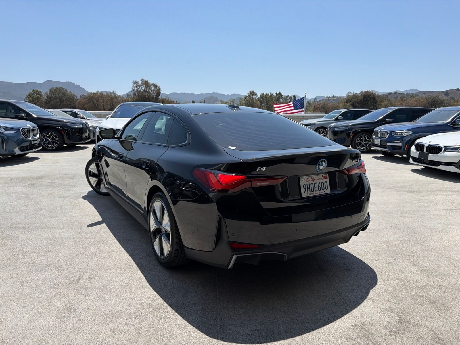 Certified Used 2023 Black Sapphire Metallic BMW eDrive40 image 2