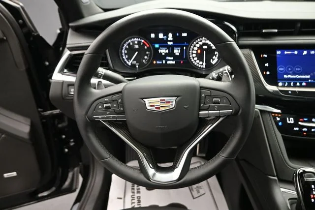Certified Used 2025 Stellar Black Metallic Cadillac Sport image 15