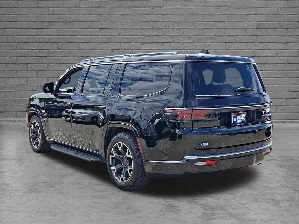 Used 2023 Diamond Black Crystal Pearlcoat Jeep Series III image 8