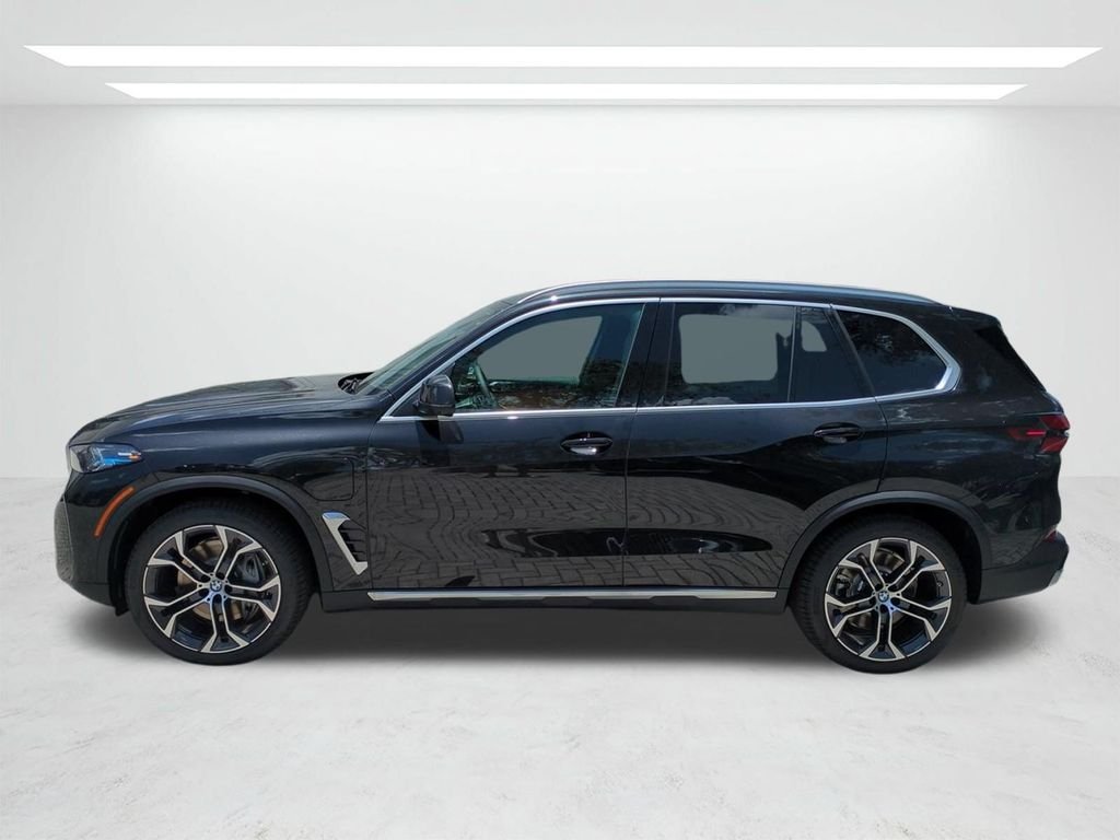 New 2026 Black Sapphire Metallic BMW xDrive50e image 7