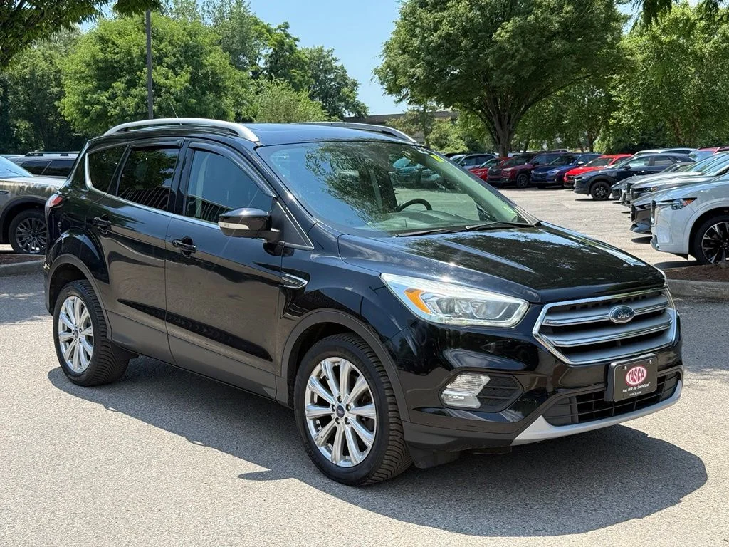 Used 2017 Black Ford Titanium image 1