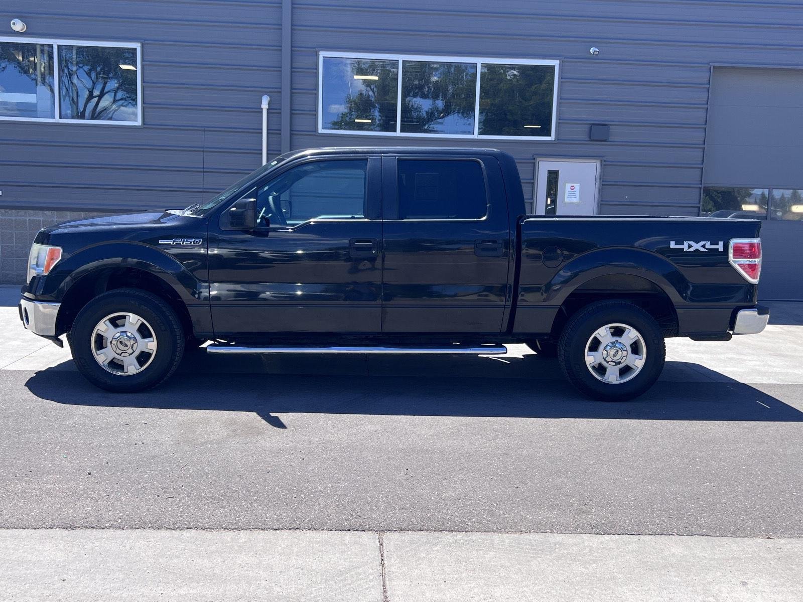 Used 2011 Tuxedo Black Metallic Ford XLT image 8