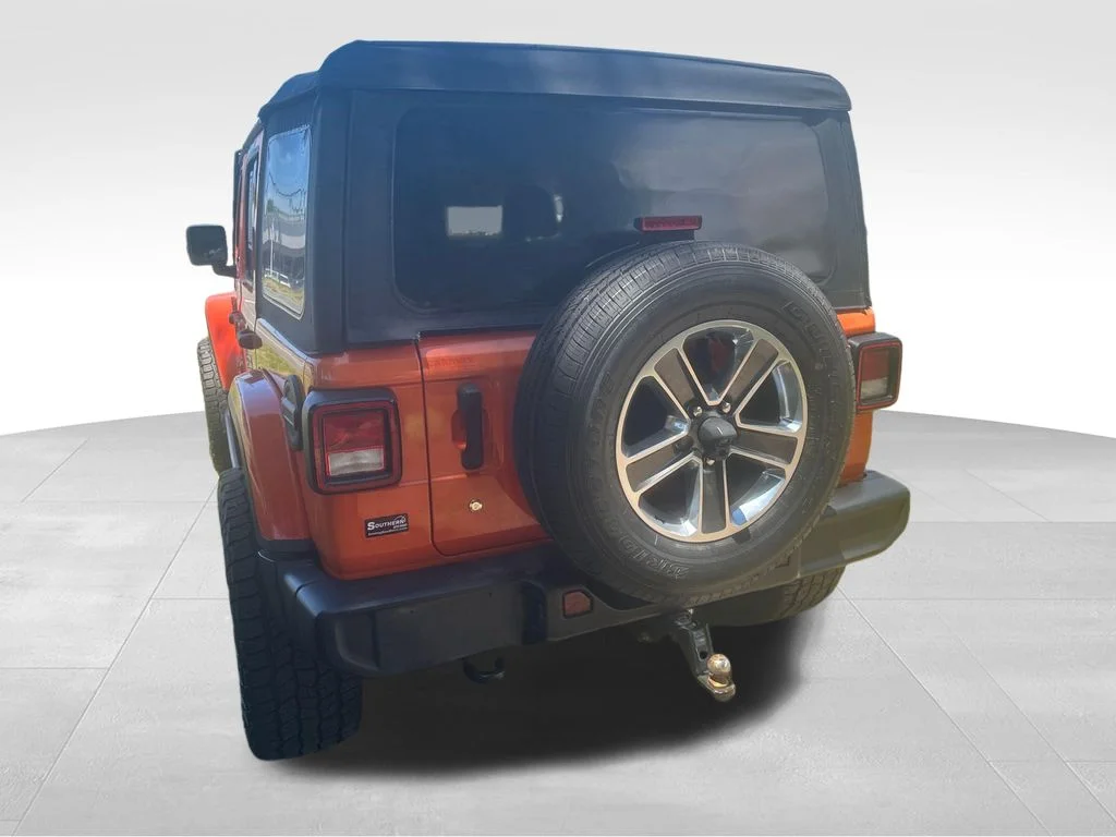 Used 2018 Orange Jeep Unlimited Sahara image 19