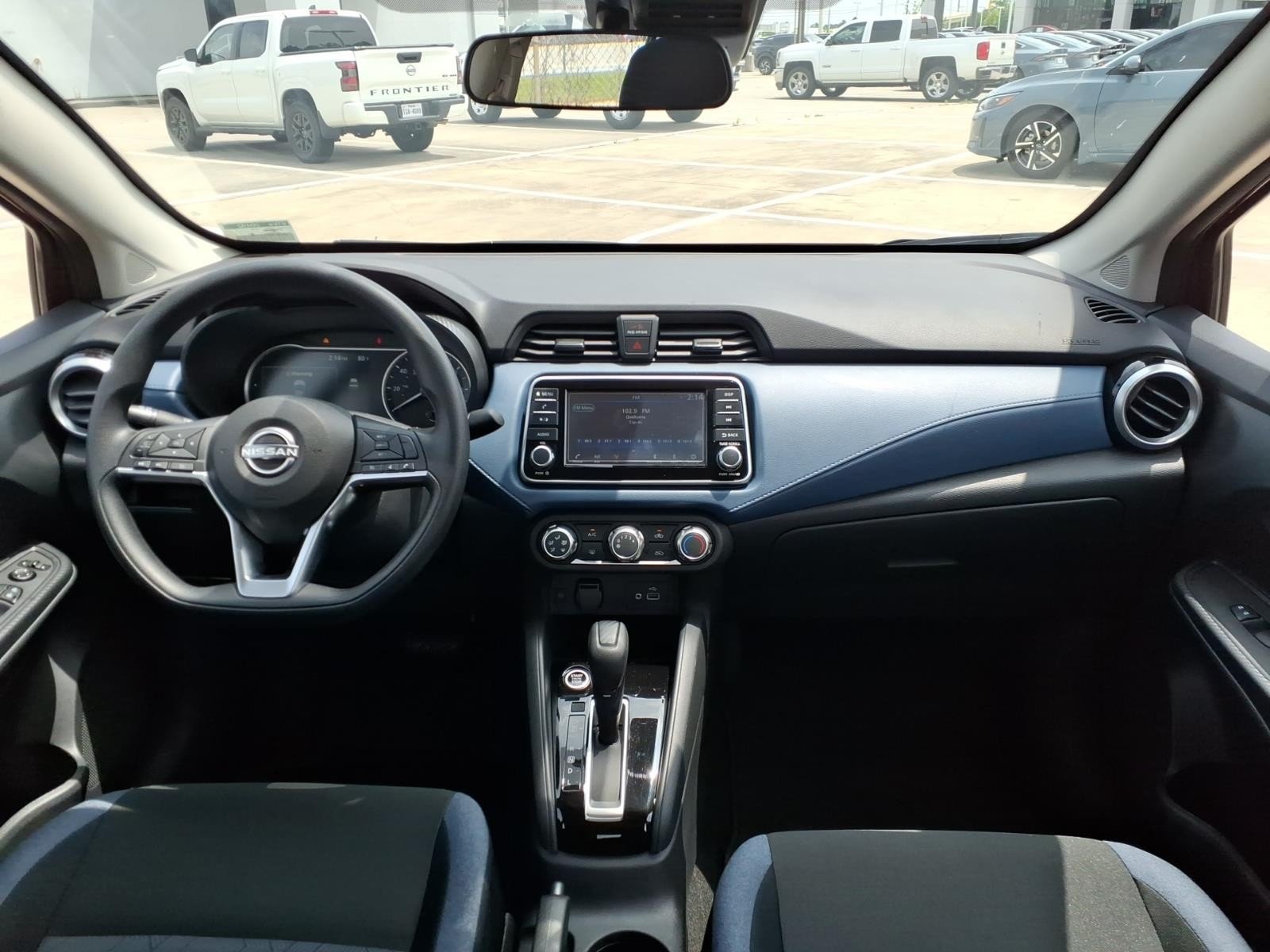 2025 Nissan Versa SV Red at Robbins Nissan