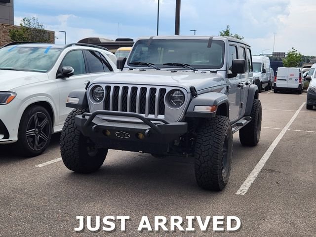 Used 2021 Silver Jeep Unlimited Sport image 1