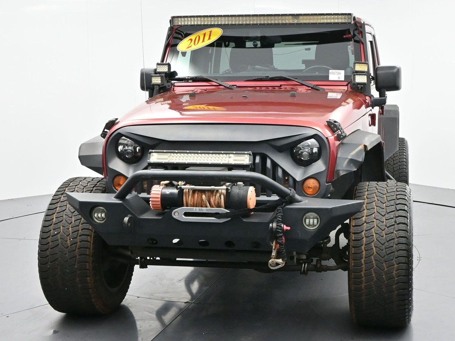 Used 2011 Deep Cherry Red Crystal Pearlcoat Jeep Sahara image 2