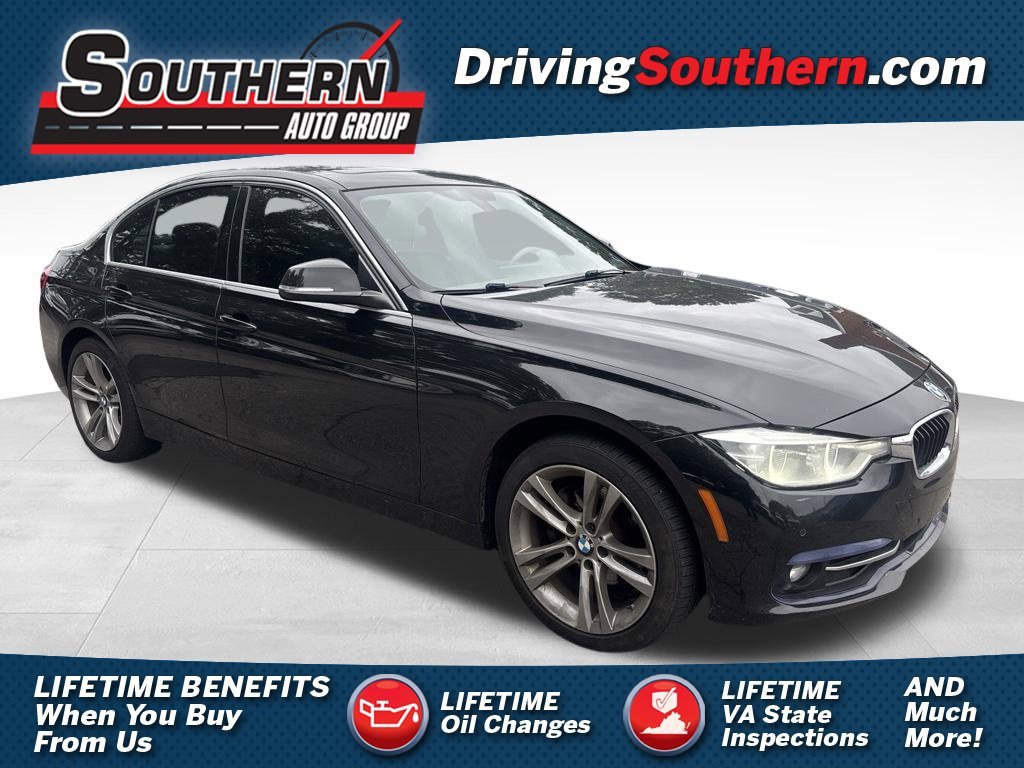 Used 2017 Black BMW 330i xDrive image 1