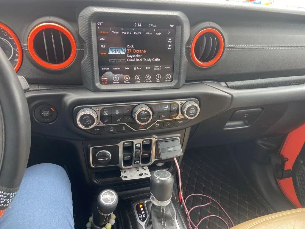 Used 2019 Orange Jeep Unlimited Sahara image 34