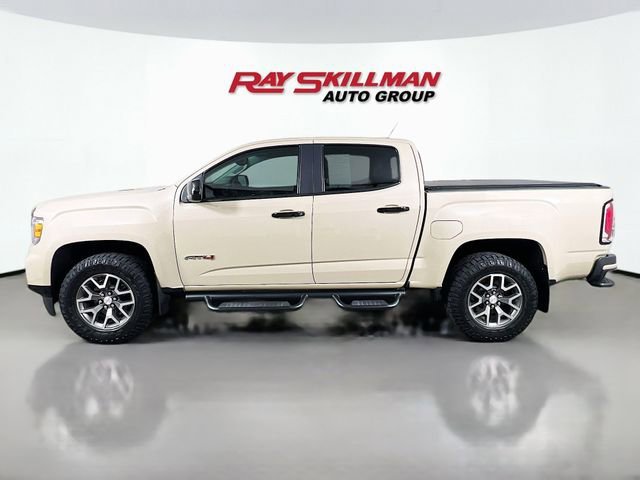 Used 2021 DESERT SAND METALLIC GMC 4WD AT4 w/Leather image 4